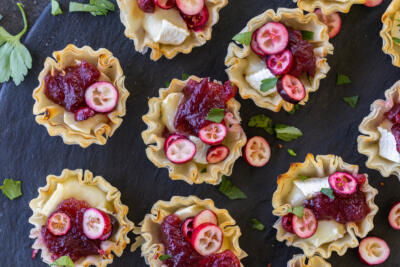 Brie and Cranberry Bites on a serving dish.