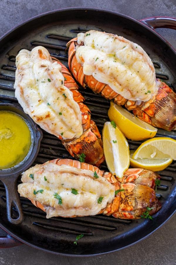 Grilled lobster tails with butter