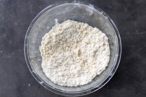 Flour with butter grated into the bowl.