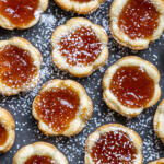 Jam Tarts with powdered sugar.
