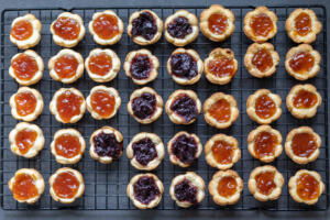 Jam Tarts on a cooling rack.
