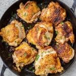 Pan-Seared Chicken Thighs in a pan