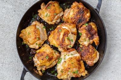 Pan-Seared Chicken Thighs in a pan