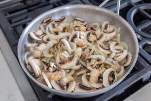 Mushroom and onion on a pan.