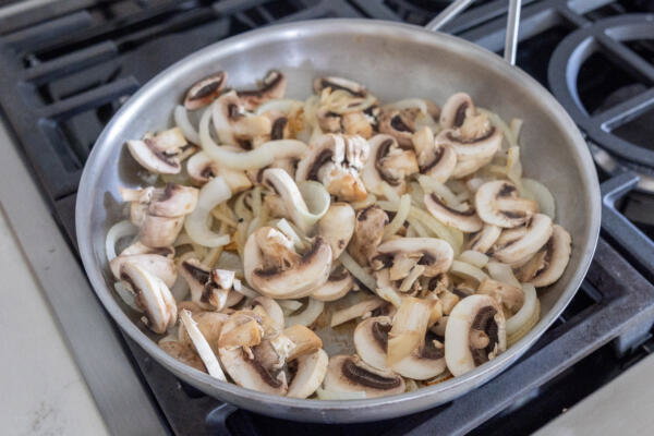 Mushroom and onion on a pan.