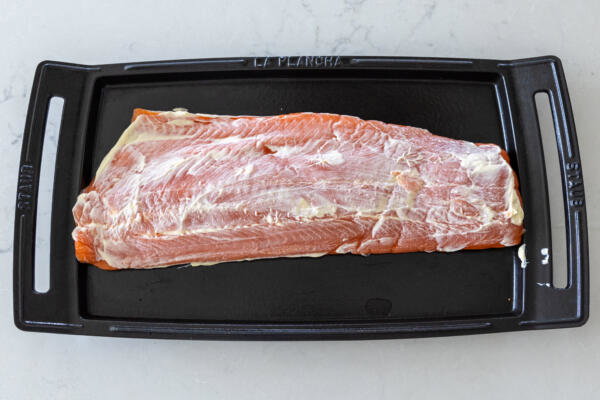 Salmon on a pan with mayo.