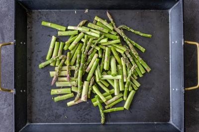 Sliced asparagus in a tray