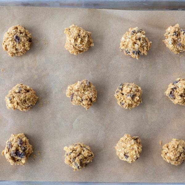 Oatmeal Raisin Cookies on a baking sheet