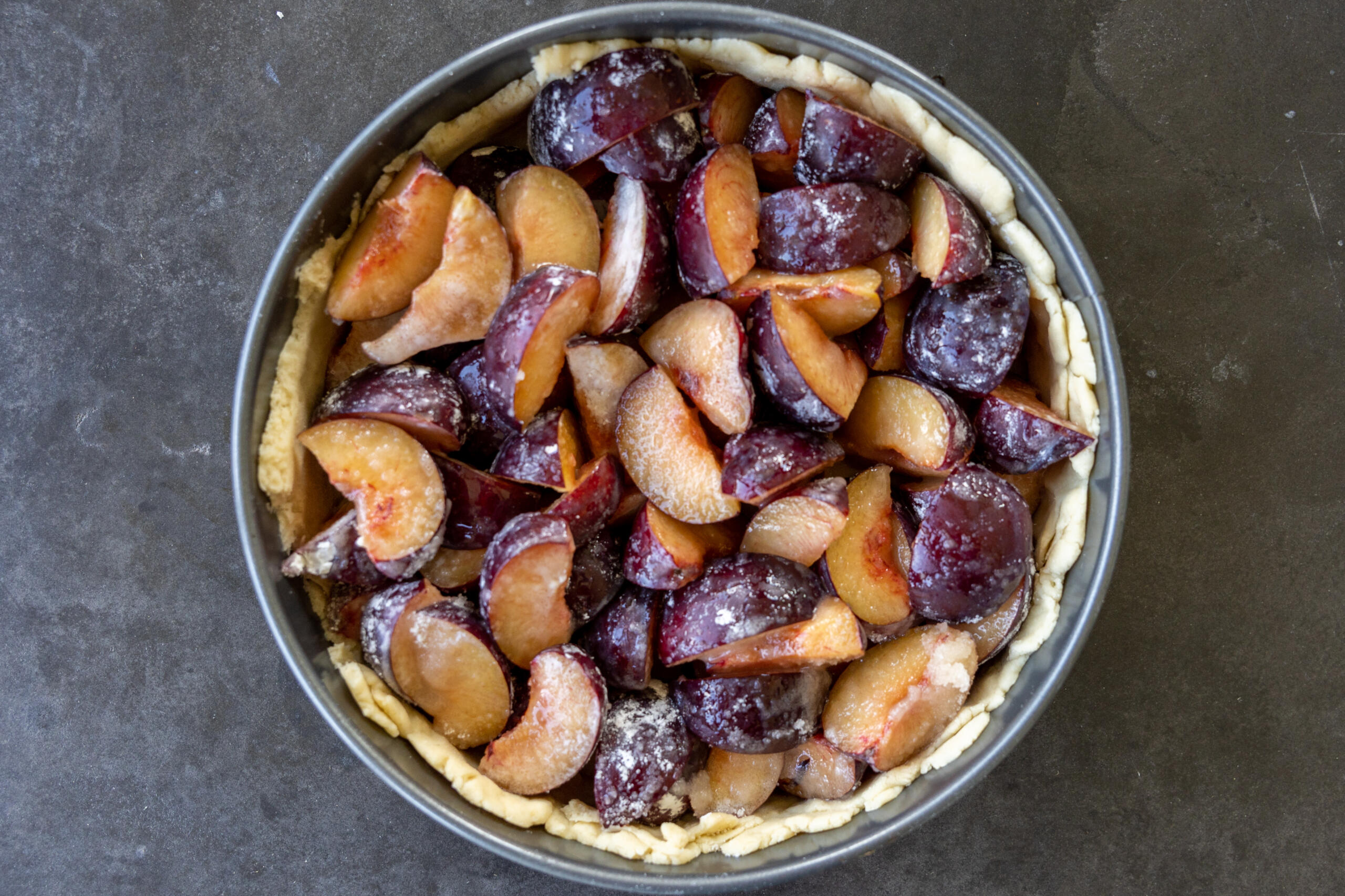 Plum crust and a plum filling a baking dihs.