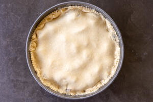 European Plum Pie before baking in a pan.