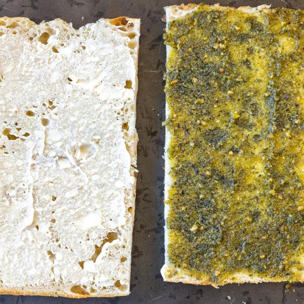 mayo and pesto added to focaccia bread