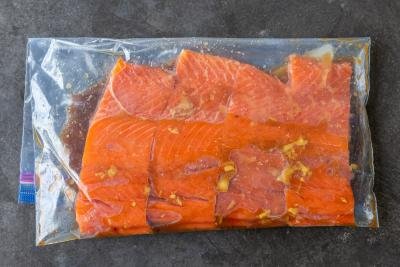 Marinating salmon in a ziplock bag.