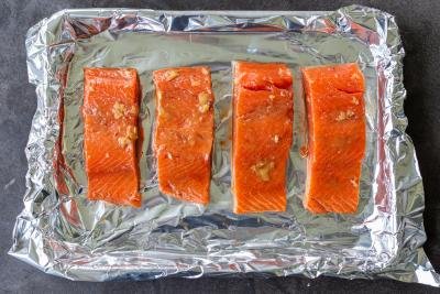 Teriyaki salmon on a baking sheet.