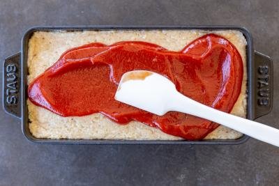 ketchup spread out on chicken