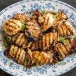 Grilled Chicken Thighs on a plate.