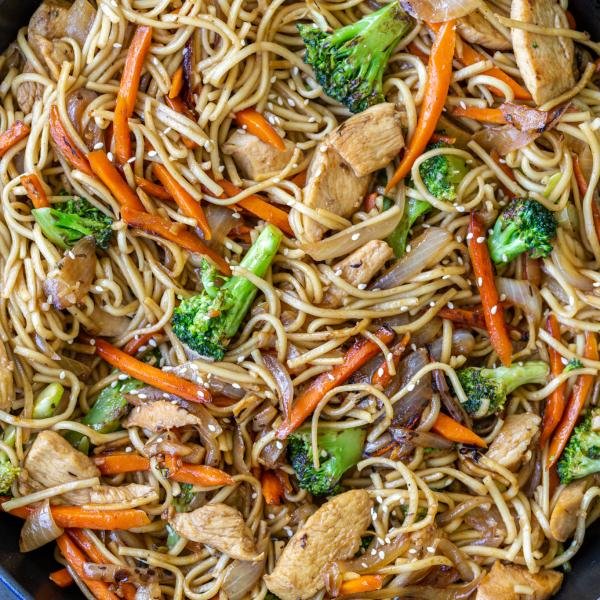 Chicken lo mein in a pan.