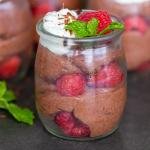 Chocolate Mousse cups with mint and raspberries in a cup.