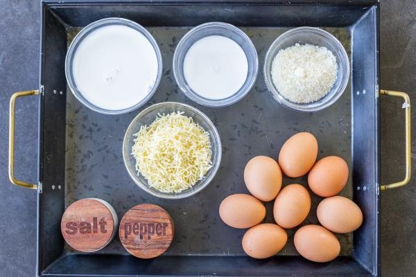 Ingredients for crustless quiche on a tray.