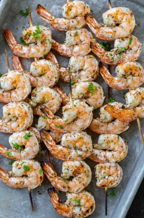 Grilled shrimp kabob on a tray.