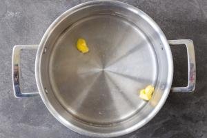 water with butter in a pot