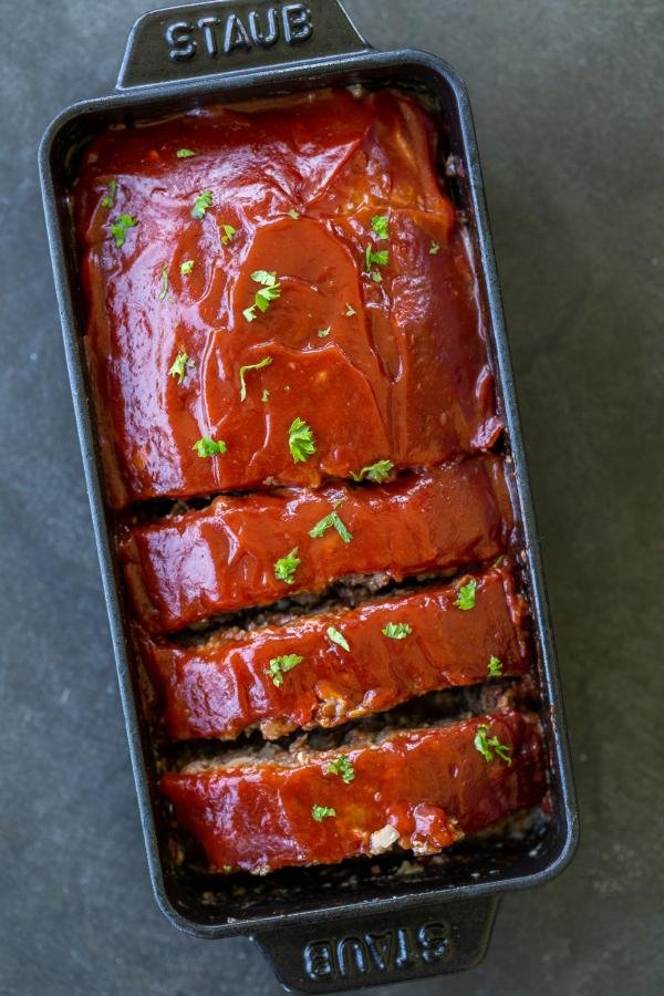 Baked Meatloaf Recipe with Oatmeal, sliced into pieces.