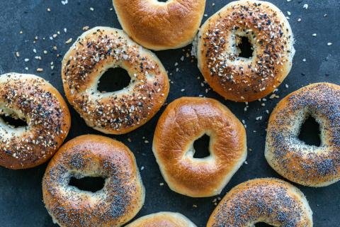 Baked bagels with different topping.