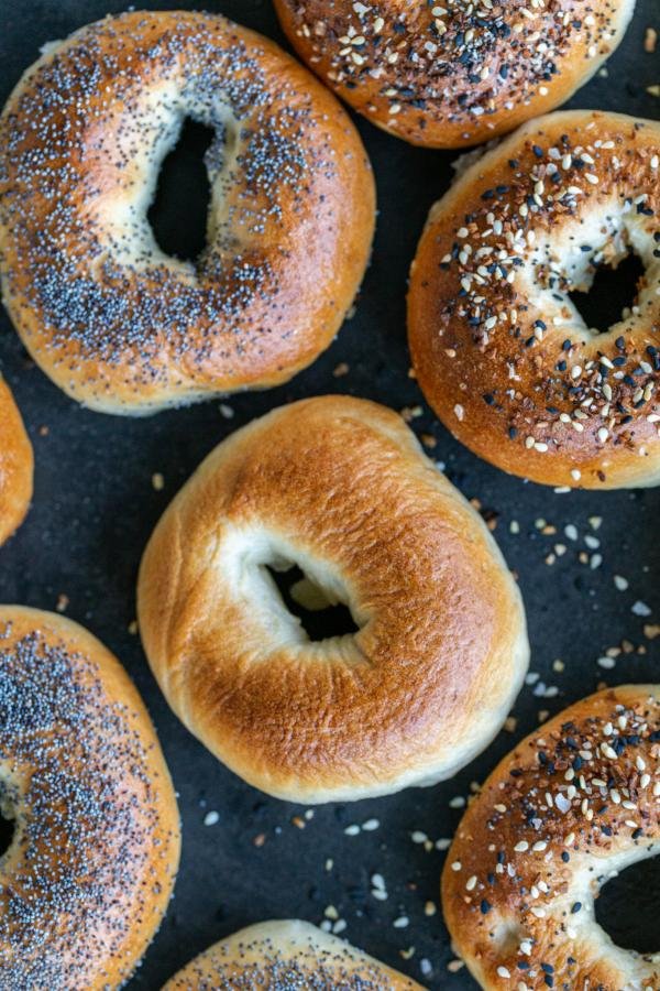 Baked bagels with different topping.