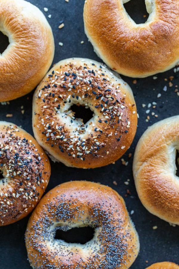 Baked bagels with different topping.