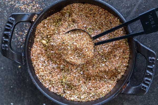 a dish with taco seasoning in a dish with a spoon