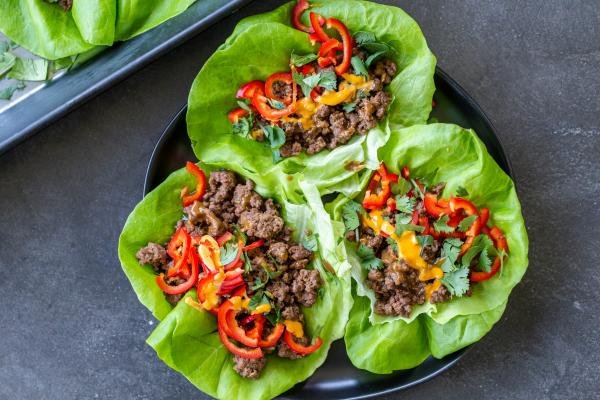 Beef lettuce wraps on a plate.