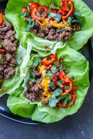 Beef lettuce wraps on a tray.