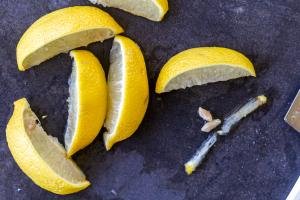 Lemon seeds removed from lemon wedges.