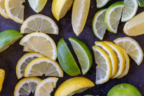 Lemon and limes cut into wedges and slices.