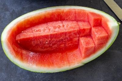 Watermelon cut into cubes in a watermelon.