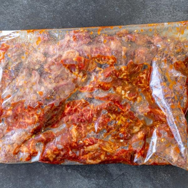 Beef marinating in a bag