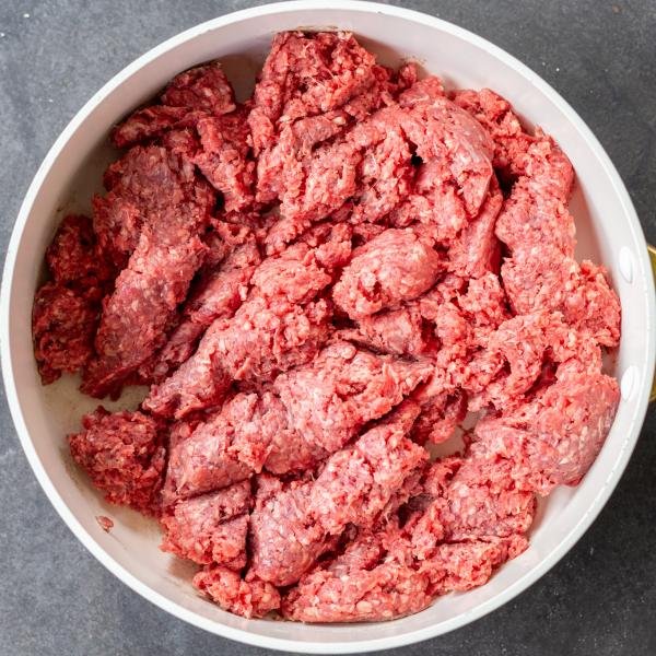 Ground beef in a pan.