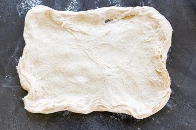 Stretched dough on a counter