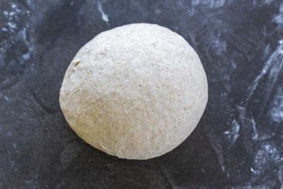 Shaped bread on a floured surface