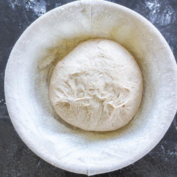 Shaped bread in a proofing basket
