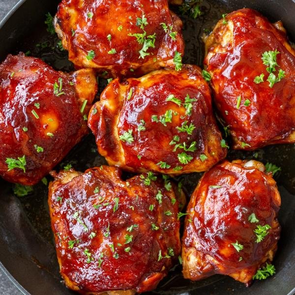 Baked BBQ Chicken with herbs and a pan.