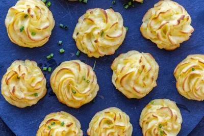 Duchess Potatoes with green onions.
