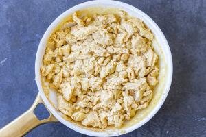 Cooked eggs in a pan.