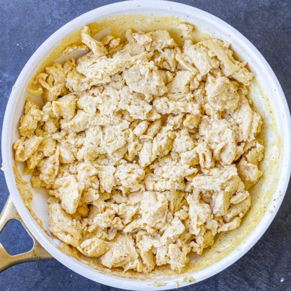 Cooked eggs in a pan.