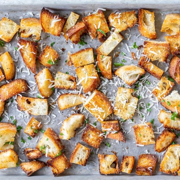 Homemade Croutons on a tray with herbs