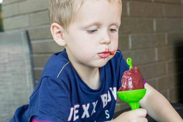 A boy and a popsicle.