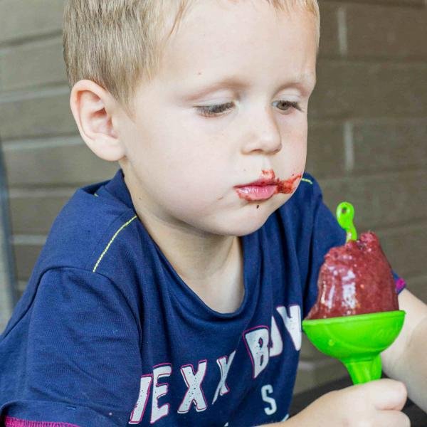 A boy and a popsicle.