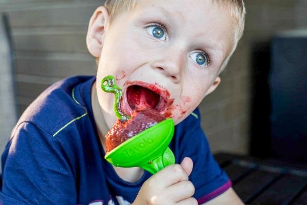 A boy and a popsicle.