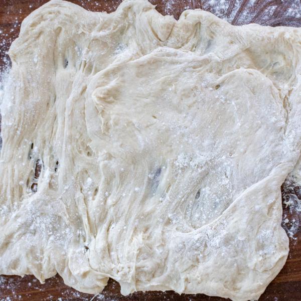 Stretched out Sourdough Sandwich Bread dough.