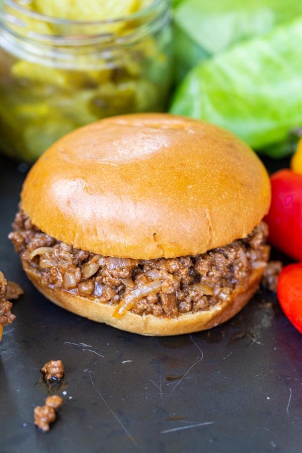 Sloppy Joes with veggies on a serving tray.