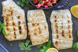 Grilled Halibut on a serving pan and pico on the side.